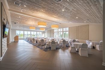 A large room with tables and chairs